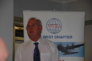 In December, Bob Quick, former integrated project team leader for the U.K. Defence Information Infrastructure (DII) program, addresses the chapter meeting.